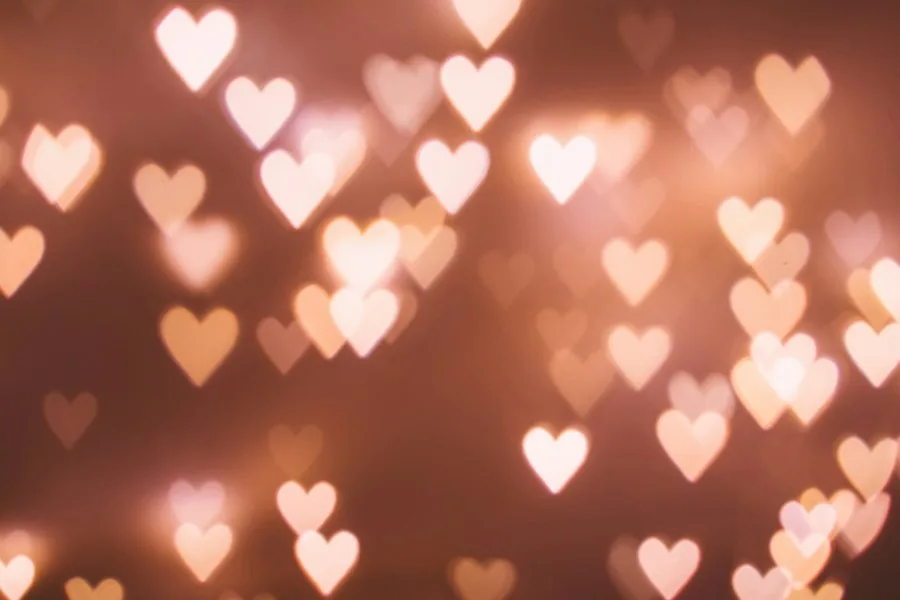 Heart-shaped bokeh lights (illustrative stock photo)